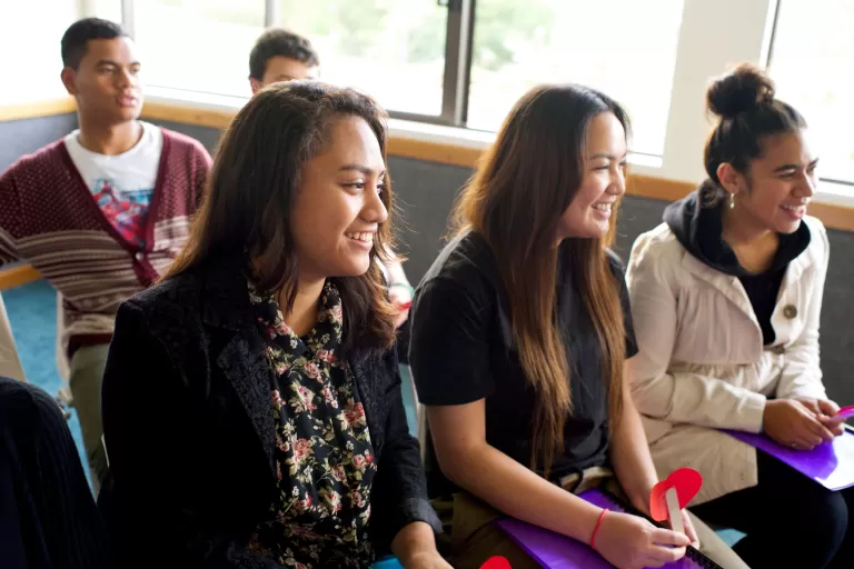 Youth sitting in a classroom during Sunday School